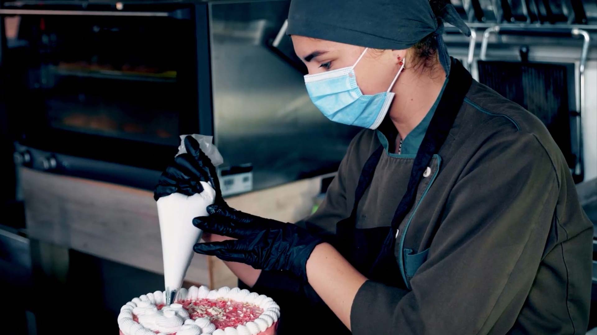 Small Business Owner Icing a Cake