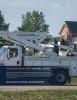 Bucket truck on residential road