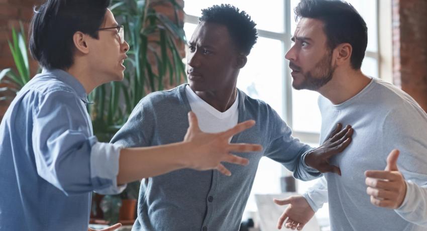Photo showing men arguing.