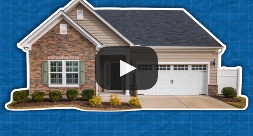 Photo of a house, background is blue