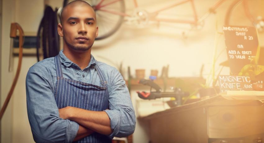 Young man in bike shop