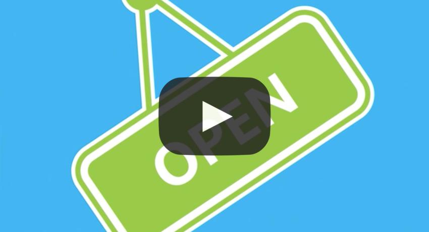 Still of a video showing green sign in front of blue background that says Open