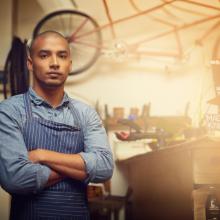 Young man in bike shop