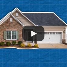 Photo of a house, background is blue