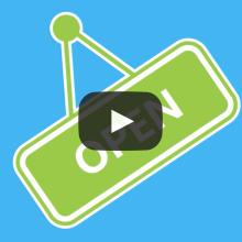 Still of a video showing green sign in front of blue background that says Open